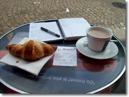 What to eat in Paris? Croissants and coffee at the foot of the Sacre Coeur church in Montmartre.
