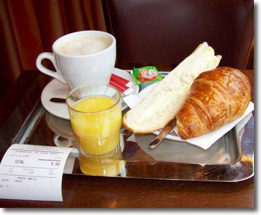 What to eat in Paris? Paris Croissants with a cup of tea or coffee - and juice too - are perfect to start your day.