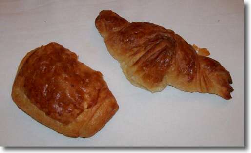 What to eat in Paris? Two croissants - a butter croissant and a pain au chocolat which is a chocolate croissant.